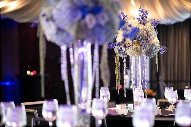 A wedding planner can help you with details like floral arrangements and table decor. 