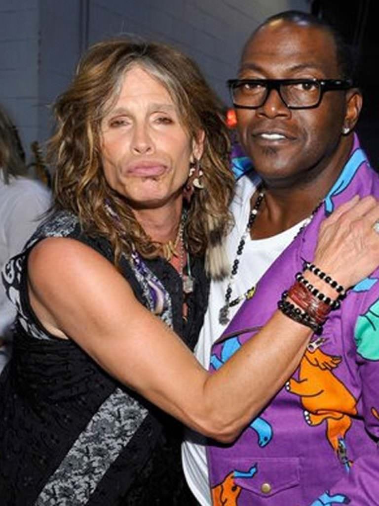 Randy Jackson Steven Tyler wearing pearl necklaces.