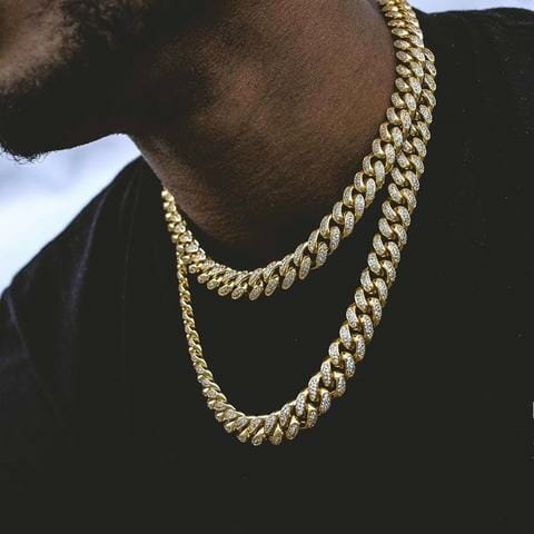 Even men love gold. This Diamond Cuban Link Choker in Yellow Gold makes any man look sexy.