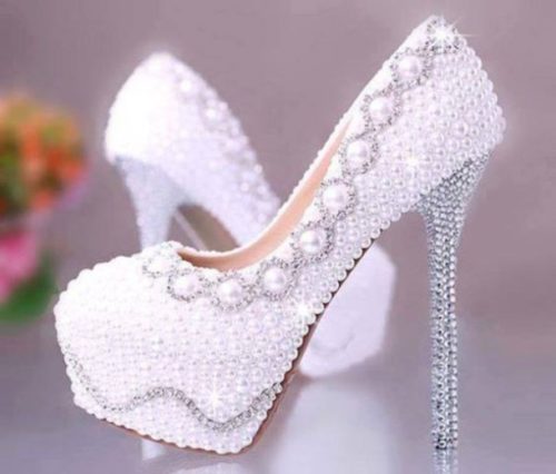 Check out these pearl-embellished stilettos. Aren't they perfect for the boss lady headed to a stunning business affair?