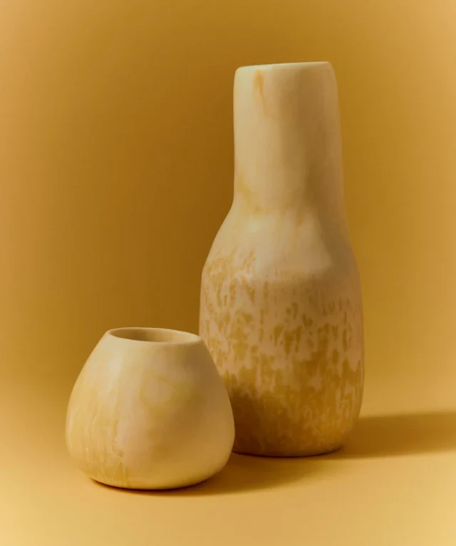 Yellow resin vase from Dinosaur designs.