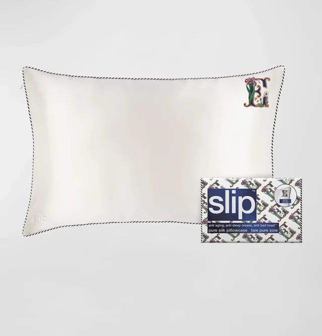 Silk pillowcase monogrammed with the letter E.