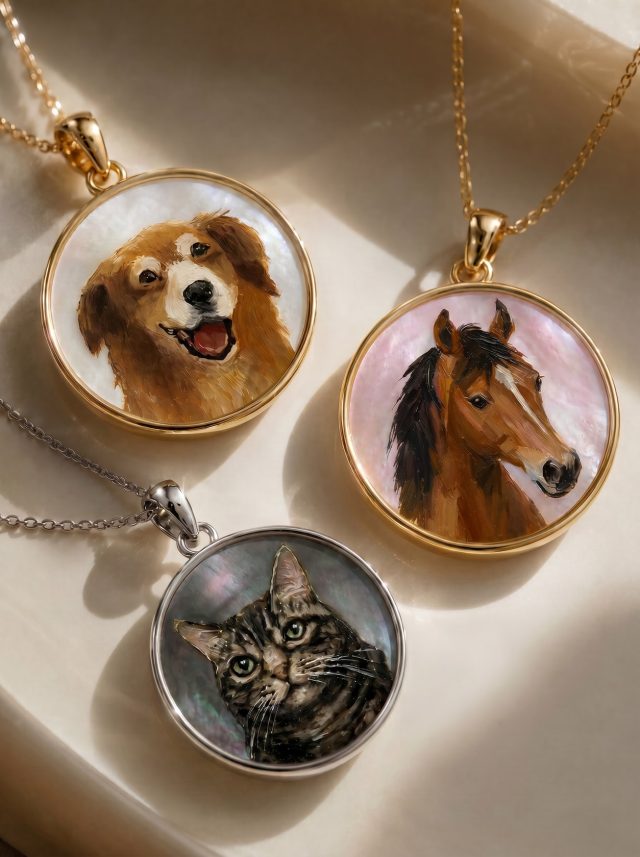 Custom pet portraits painted on Mother of Pearl.